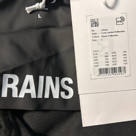 RAINS NWT Men’s Black long reflective Rain coat, size LG. pockets. Arm Venting - Picture 9 of 11